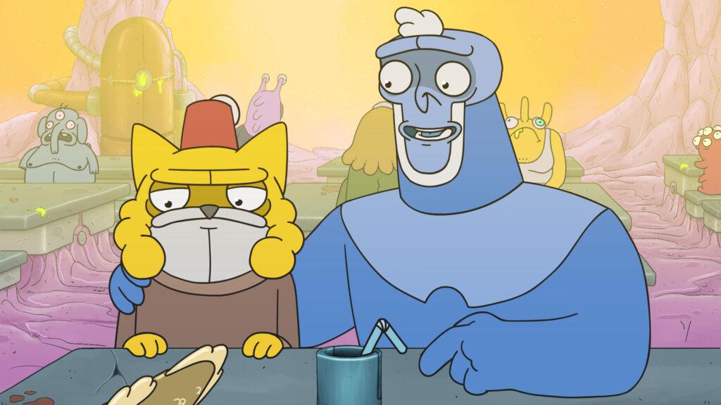 Tau-Blau und Sonnengelb sitzen in einer gefüllten Kantine. Sonnengelb starrt genervt auf einen Pokal, während Tau-Blau ihn versucht aufzuheitern.